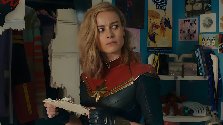 Captain Marvel looks to side