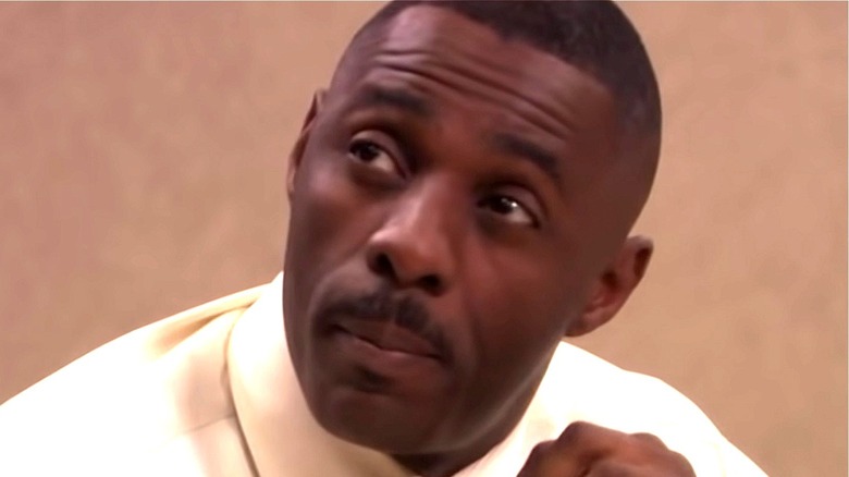 Idris Elba playing Charles Miner