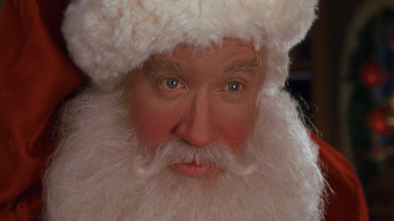 Scott Calvin as Santa Claus gently smiling
