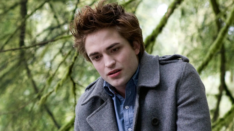 Edward gray coat looking down