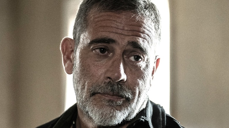 Negan smirking