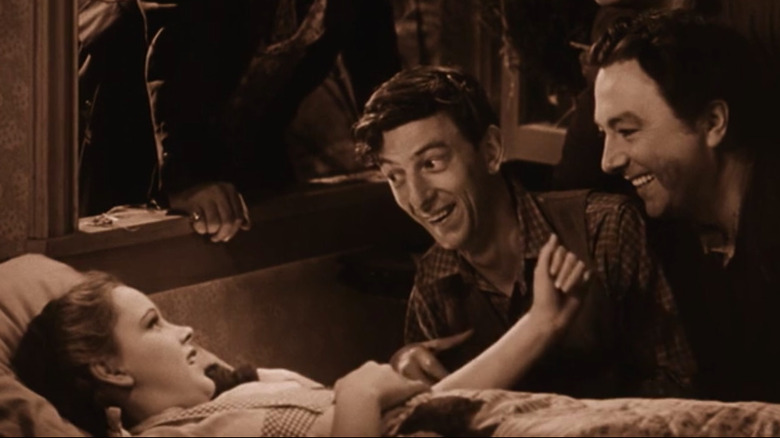 Dorothy waking to her friends