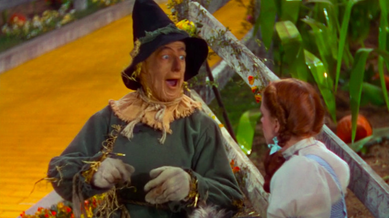 The scarecrow talking to Dorothy