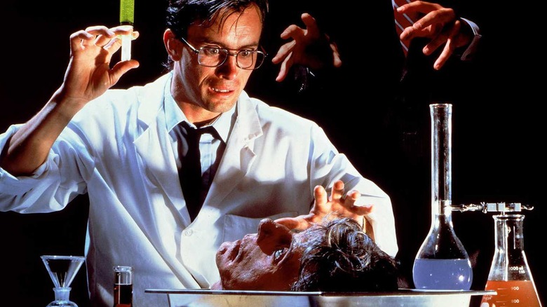 Jeffrey Combs in promotional art from Re-Animator