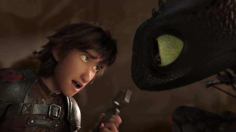 Hiccup talking to Toothless