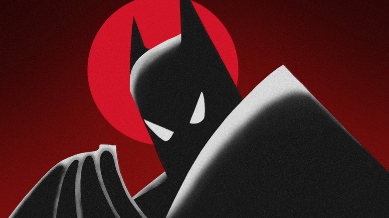 Batman prepares to throw a batarang in Batman: Mask of the Phantasm