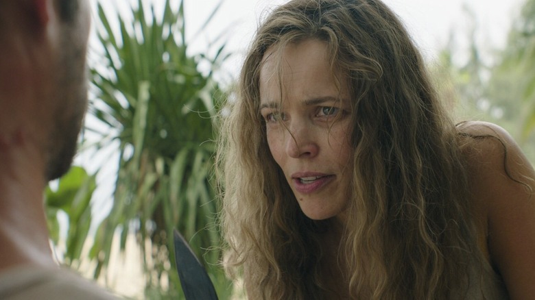 Linda holding a knife in front of Bradley in "Send Help"