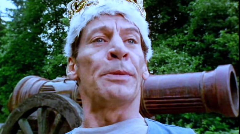 Ernest with a crown and cannon in "Ernest Rides Again" (1993)