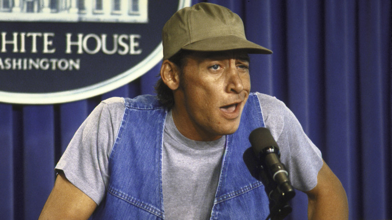 Jim Varney as Ernest talks to the press at the White House