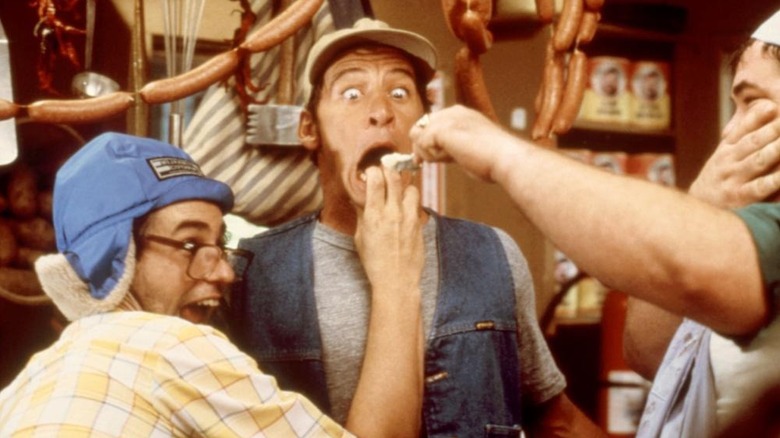Ernest being forced to eat gruel in "Ernest Goes to Camp" (1987)