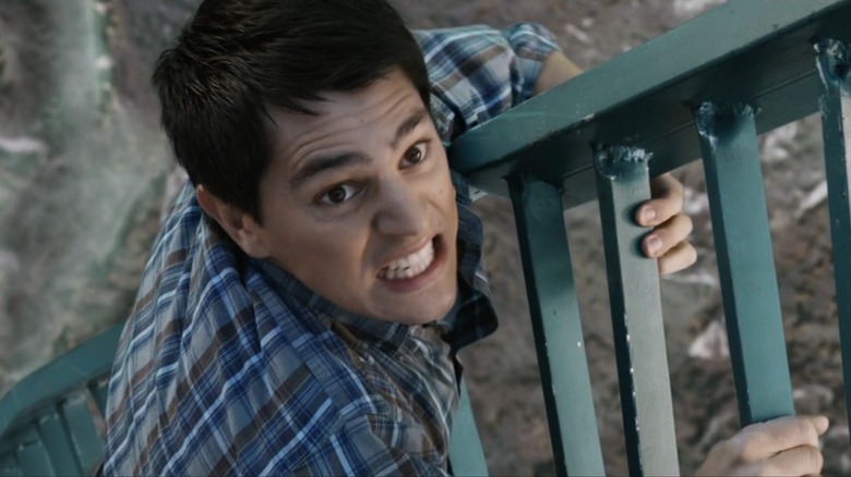 Sam dangling from the collapsing bridge in "Final Destination 5" (2011)