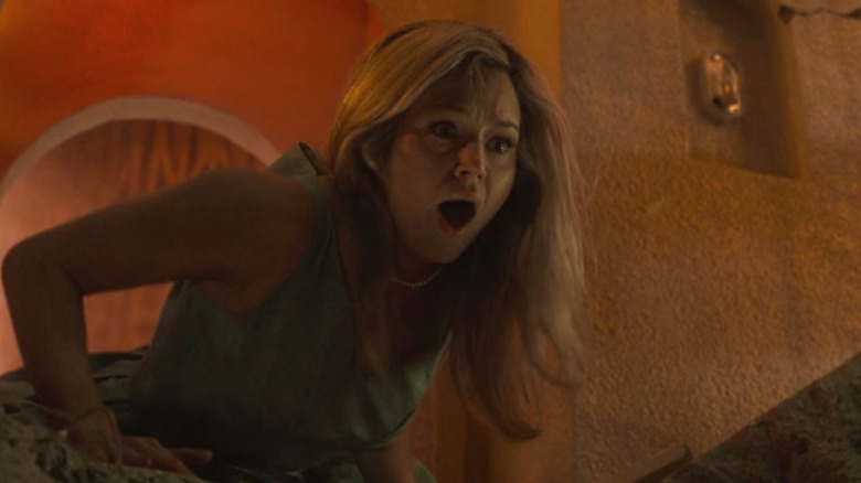 Iris watches the Sky View Tower collapse in 