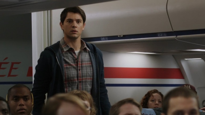 Sam on a plane at the end of "Final Destination 5" (2011)