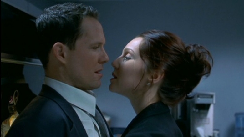 Kirsty Cotton leaning in to kiss Trevor Gooden in Hellaraiser: Hellseeker (2002)