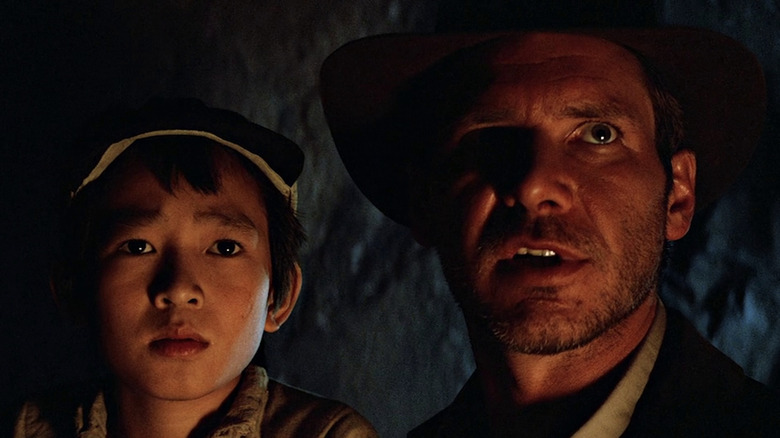Indiana Jones and Short Round looking intense in Raiders of the Lost Ark (1981)