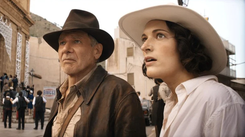 Indy and Helena look onward at their enemies in Indiana Jones and the Dial of Destiny (2023)
