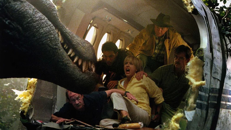 Alan Grant (Sam Neill) and his crew are attacked by a spinosaurus in Jurassic Park III (2001)