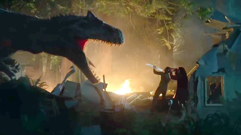 A family stands against a T-rex in Battle at Big Rock (2019)