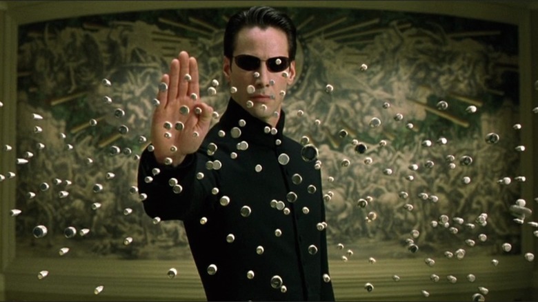 Neo stops bullets in the air in "The Matrix Reloaded" (2003)