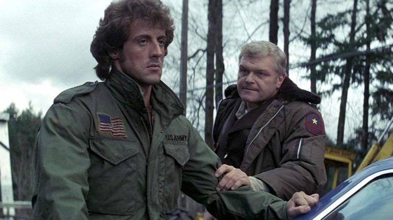 Sheriff Will Teasle grabs John Rambo in First Blood (1982)