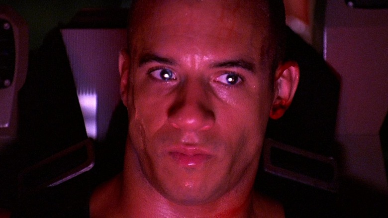 Riddick seating in ship seat in Pitch Black (2000)