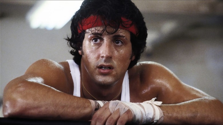 Rocky Balboa looks out sweating over the ring in Rocky II (1979)