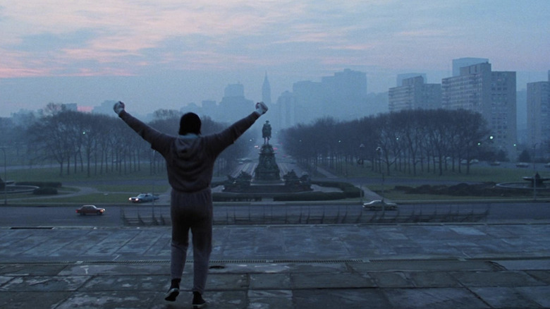 Rocky Balboa climbs the famous steps in Philadelphia in Rocky (1976)