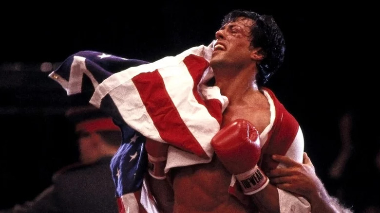 Rocky Balboa draped in an American flag in Rocky IV (1985)