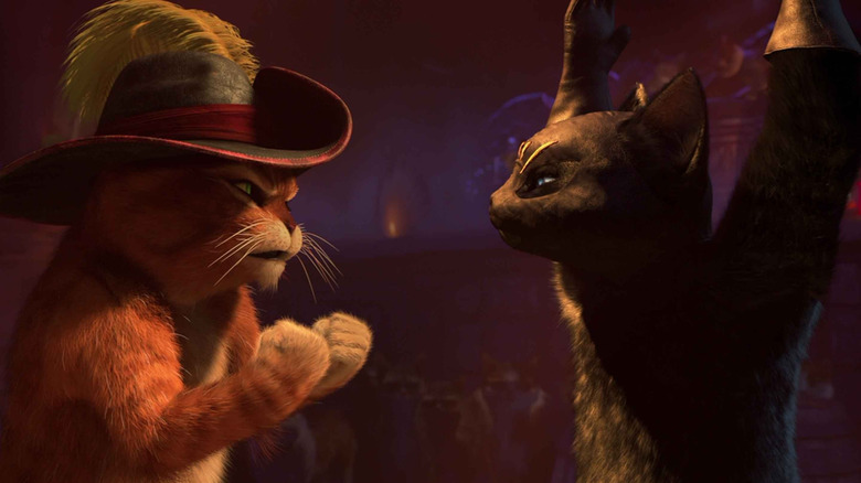 Puss getting angry at Kitty Soft Paws in "Puss in Boots"