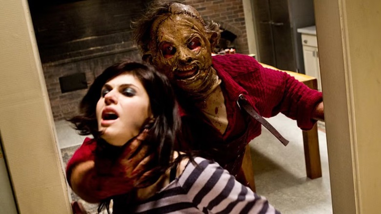 Heather being grabbed by Leatherface in "Texas Chainsaw 3D."