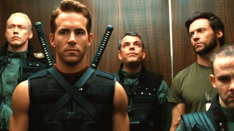 Team X, including Deadpool and Wolverine, standing in an elevator in "X-Men Origins: Wolverine" (2009)