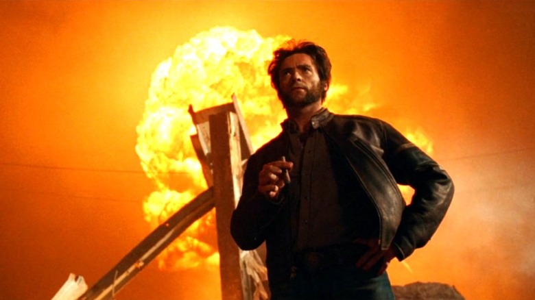 Wolverine smoking a cigar with an explosion behind him in "X-Men: The Last Stand" (2006)