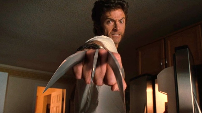 Wolverine pointing his claws at the screen in "X2" (2003)