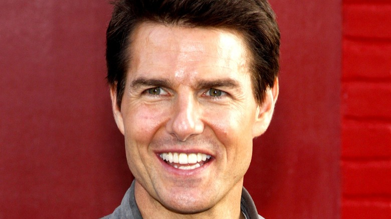 Tom Cruise red background 