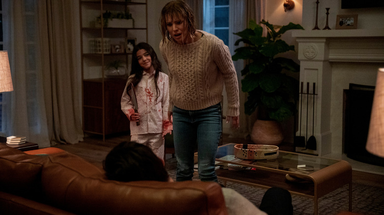 Emma with knife as Anna discovers Neil's body