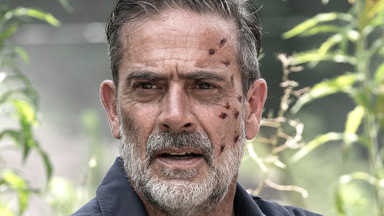 Negan with blood on his face