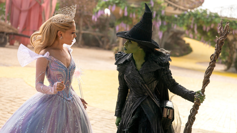 Glinda and Elphaba arguing on the yellow brick road in Wicked: For Good