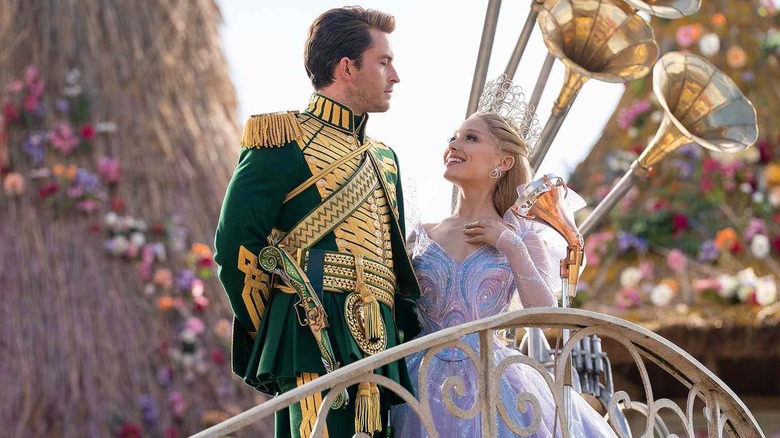 Fiyero looking down at Glinda in Oz in Wicked: For Good