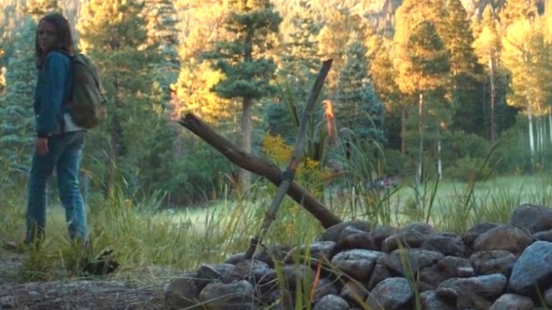 Laura leaving Logan's grave