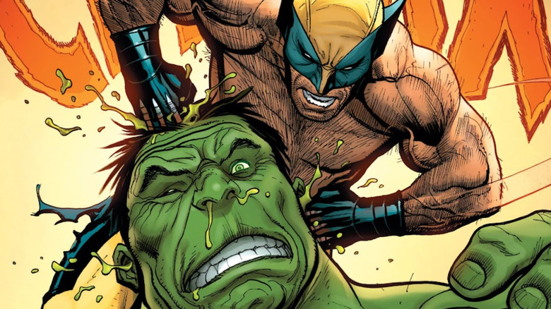 Wolverine stabs Hulk in the head