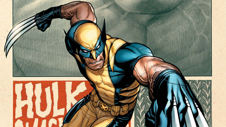 Wolverine stabs Hulk in the head
