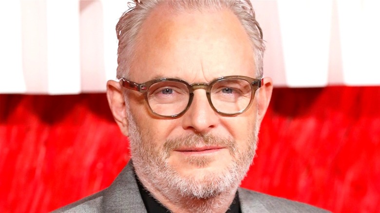 Francis Lawrence with glasses on red carpet