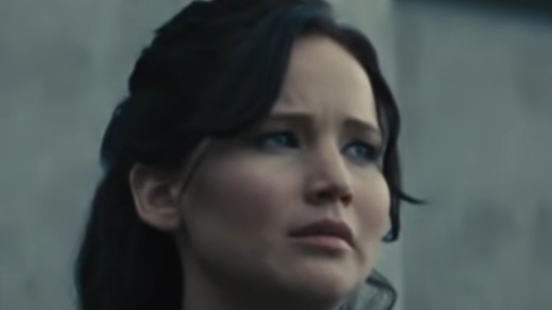 Katniss looking on