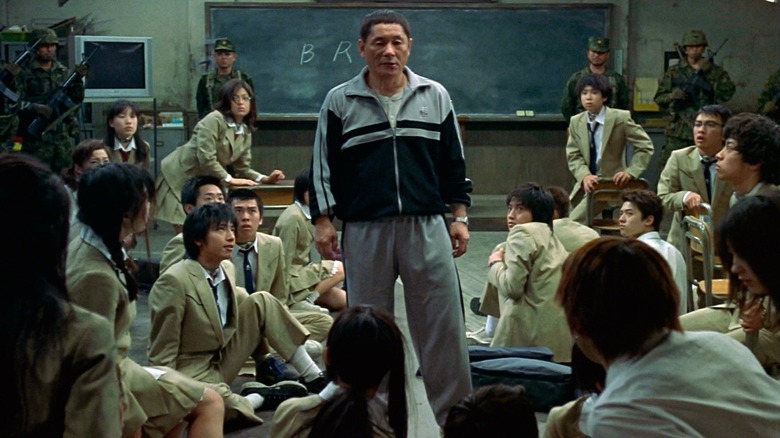 Kitano explains the rules in "Battle Royale"