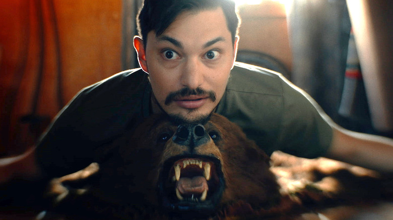 Will resting head on bear head