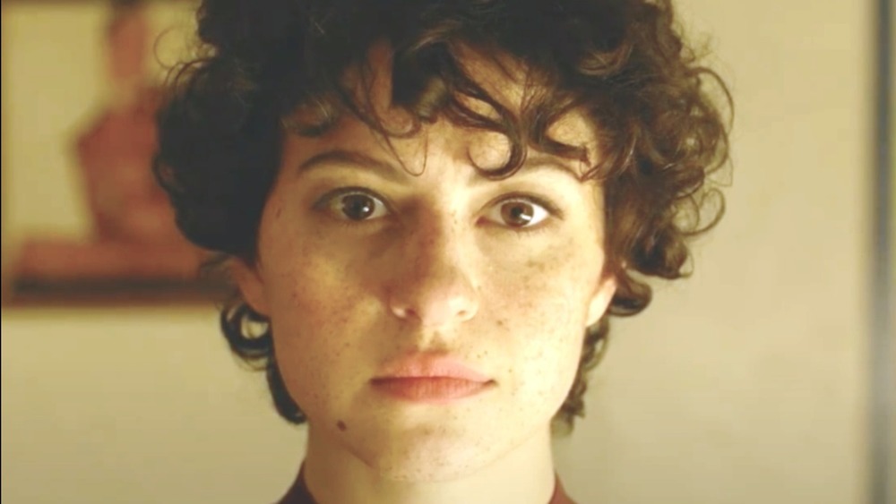 Alia Shawkat staring