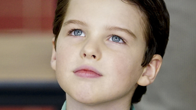 Iain Armitage as Sheldon Cooper in Young Sheldon seated at table