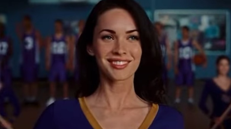 Jennifer smiling in cheerleader uniform