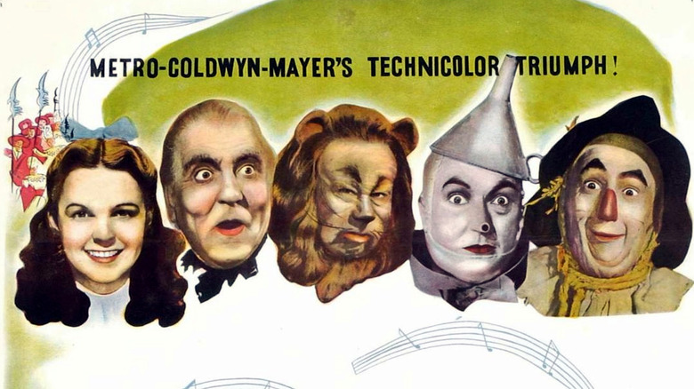 The cast of The Wizard of Oz posing