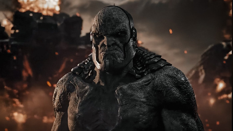Darkseid looming over a battlefield